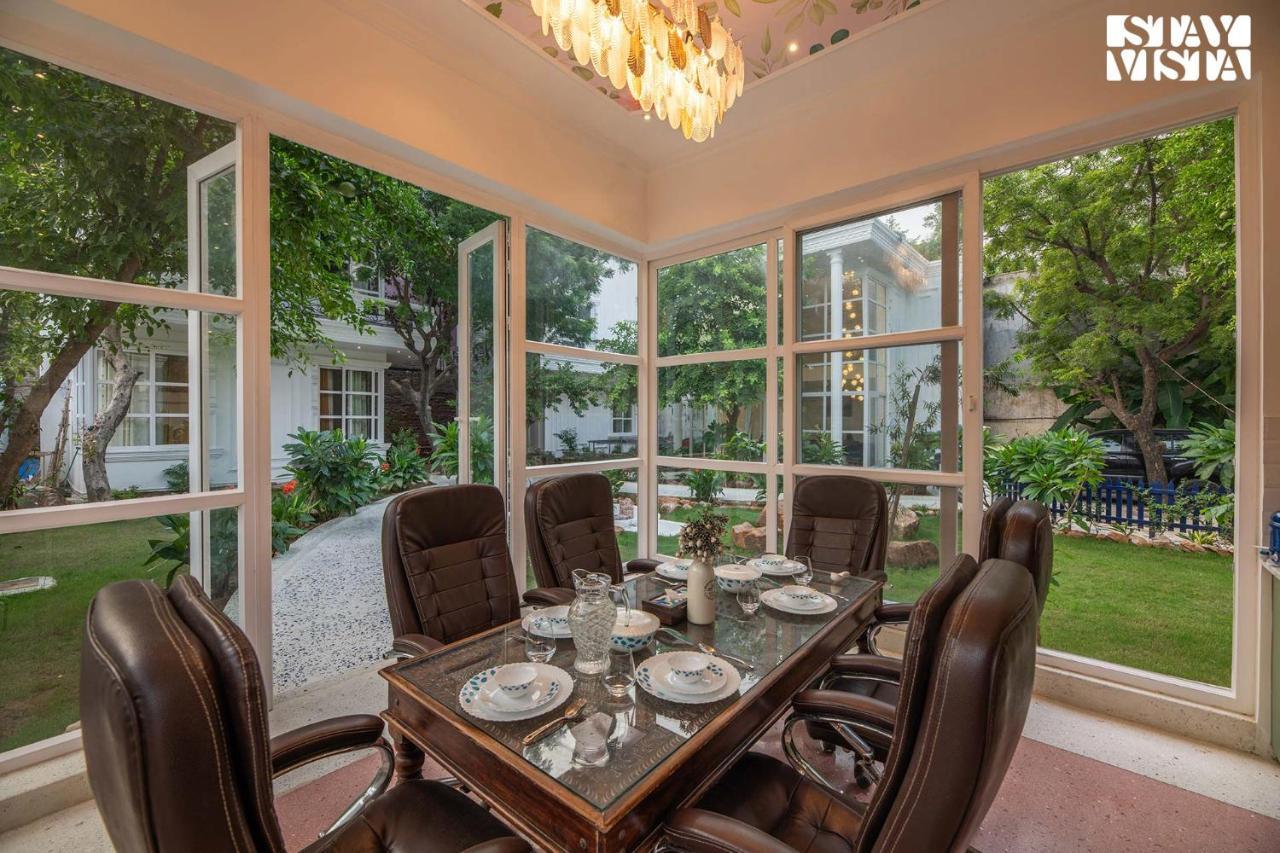 Stayvista's Indraj Manor - Roman-inspired With Posh Interiors, Mesmerizing Garden & Outdoor Fireplace Villa